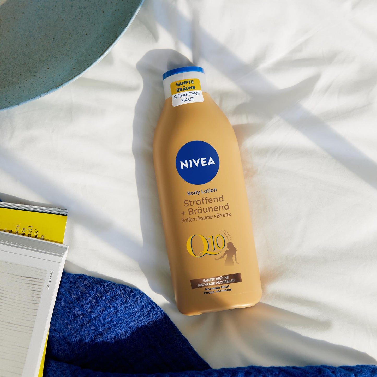 NIVEA Body Lotion Q10 Straffend + Bräunend, Pflege für eine sanfte Bräune mit frischem Sommerduft, Anti-Age Hautpflege mit Q10 für straffere Haut in 10 Tagen (200 ml)